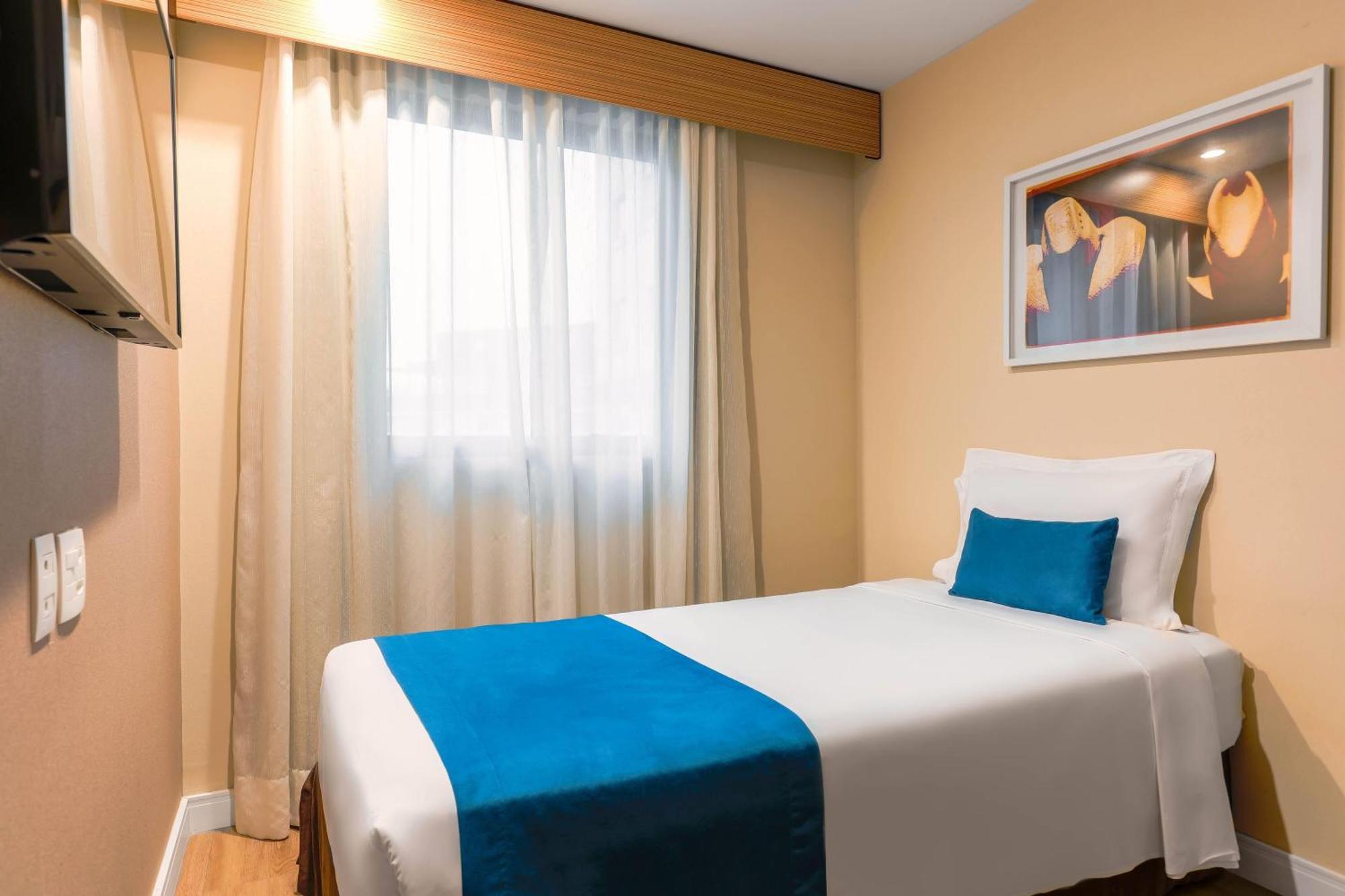 Suite with One King Bed and One Single Bed